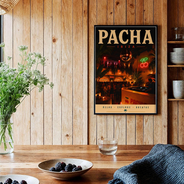 Moody nightlife interior photography print highlighting neon red cherries artwork at Pacha in Ibiza, Spain, provided by MapYourDreams with options like unframed paper, gallery canvas, or custom frames in natural wood, pure gold, and retro white styles.