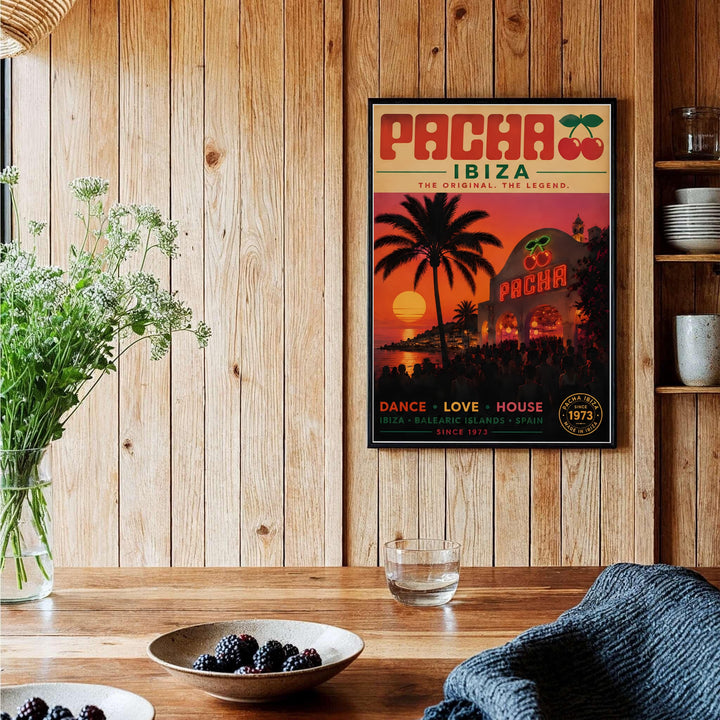 Minimalist retro club art print illustrating the iconic Pacha Ibiza cherry sign and open archways against a Mediterranean sunset sky, created by MapYourDreams with options for unframed paper prints, stretched gallery canvas, or custom frames in black and silver.