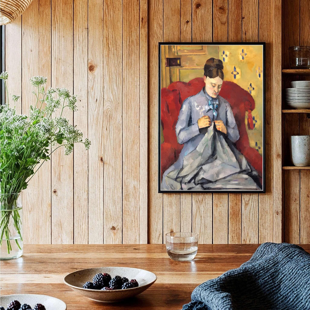 Expressive portrait painting print of Paul Cezanne Madame Cezanne Sewing 1877 painted in Paris France with soft yellow and red hues. Shop high-definition framed prints, unframed paper posters, and stretched canvas options directly at MapYourDreams for timeless arrangements.