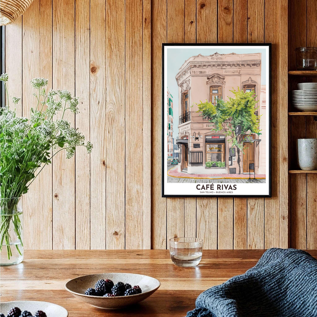 Rendered in crisp watercolor linework and washes, this San Telmo Cafe Rivas wall art depicts the historic building facade on a quiet cobblestone corner, designed by MapYourDreams in unframed, custom framed, and canvas finishes.