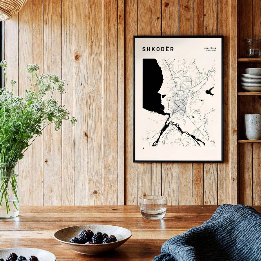 A sophisticated off-white geographical map of Shkodër, Albania, framed by clean borders and sharp serif text in the upper right corner. Available across multiple formats including unframed paper, tailored wooden frames, and gallery-wrapped canvas options.