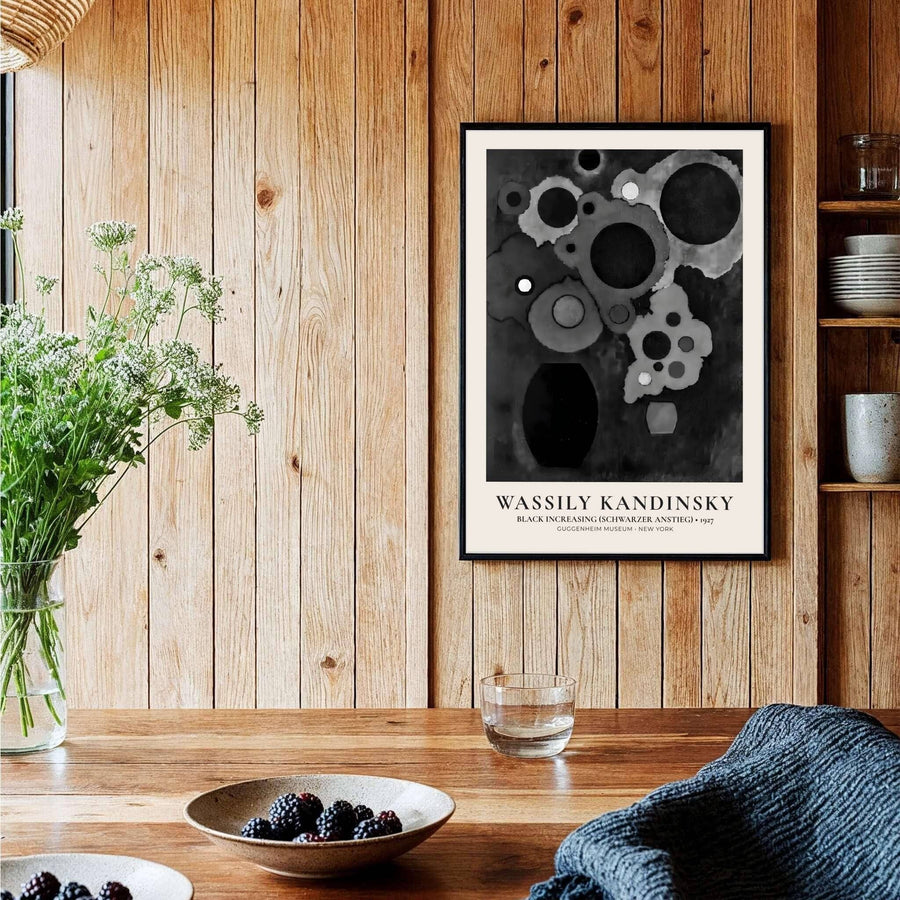 The mesmerizing contrast between dark circular motifs and luminous white highlights in Wassily Kandinsky&