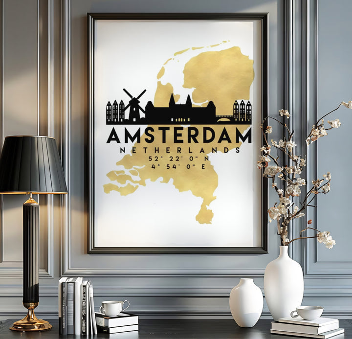 Graphic cartography travel poster of the Netherlands map silhouette in golden tones with black Amsterdam street architecture, offered by MapYourDreams as an unframed poster, a gallery wrapped canvas, or within a selection of custom frames for sleek modern apartment wall decor.