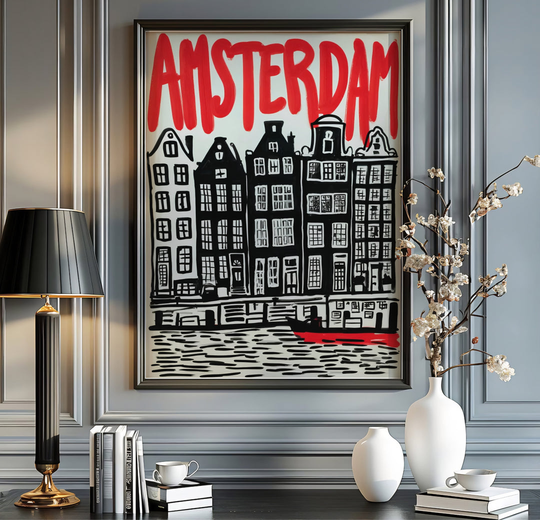 Graphic linocut travel art poster featuring black carved gables and red canal accents in Amsterdam, offered by MapYourDreams as an unframed poster, a gallery wrapped canvas, or within a selection of custom frames to create a gallery-worthy art feature.