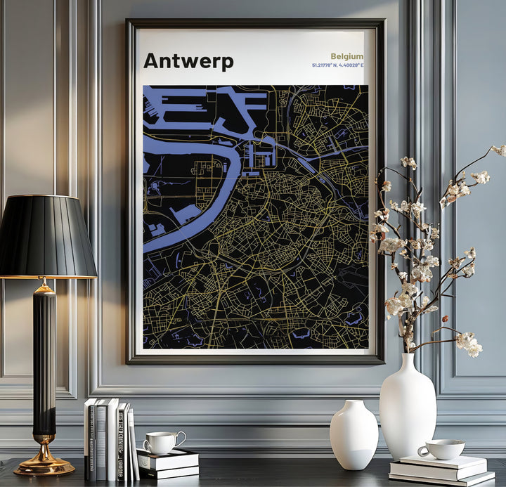 An Antwerp Belgium map print featuring sleek cartographic details, gold street avenues, and cool blue waterways on an obsidian canvas. This artwork is offered in several versatile finishes including standalone unframed paper, handcrafted frames, and gallery wrapped canvas wall art.