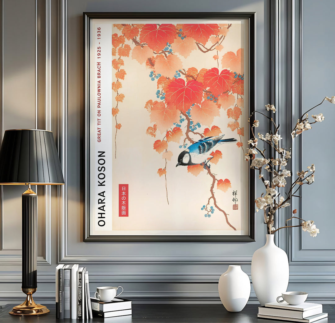 Blue and white Great Tit bird perched among red leaves by artist Ohara Koson inspired by Japanese tea house gardens in Kyoto. MapYourDreams offers versatile framed, unframed, and canvas print wall decor formats.