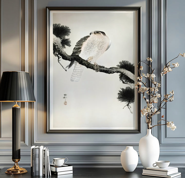 Japanese falcon perched on gnarled pine tree by artist Ohara Koson inspired by Japanese garden pavilions in Kyoto. MapYourDreams offers versatile framed, unframed, and canvas print wall decor formats.