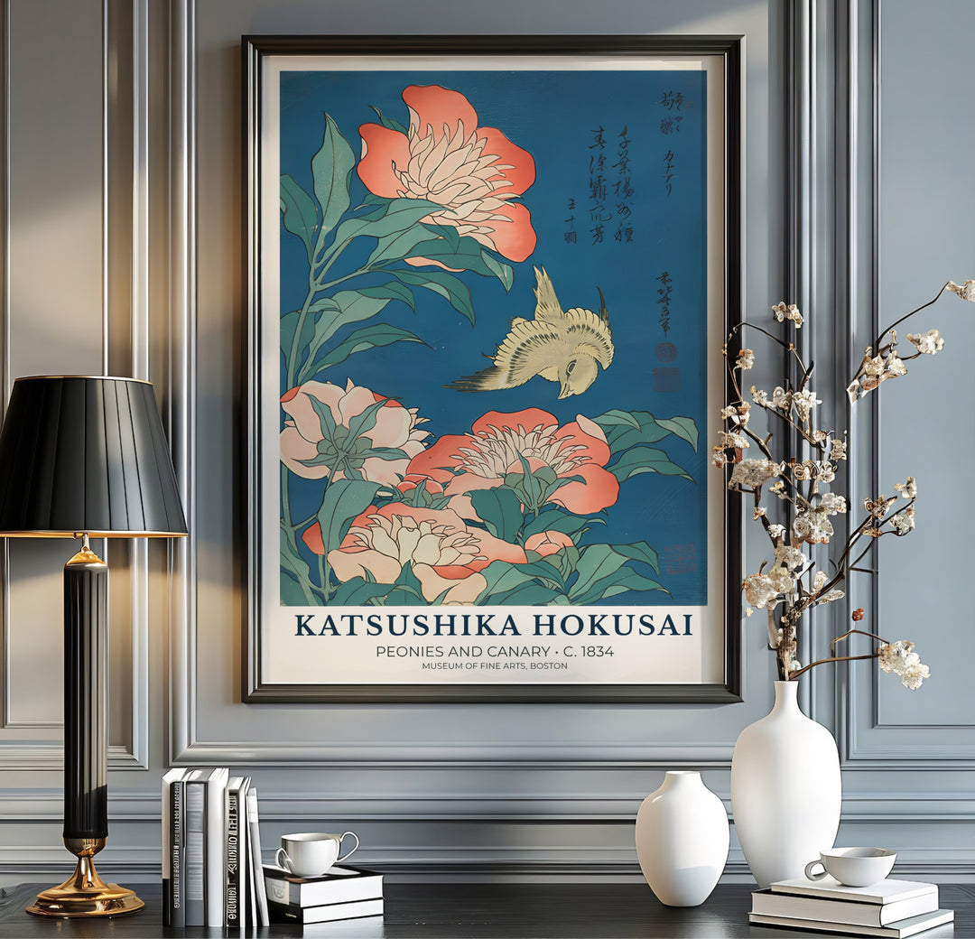 Japanese teal blue botanical print Peonies and Canary with pink peony petals by artist Katsushika Hokusai inspired by traditional Edo art in Boston. MapYourDreams offers versatile framed, unframed, and canvas print wall decor formats.