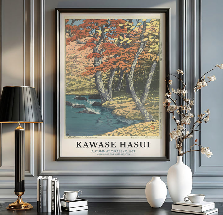 Japanese nature history print Autumn at Oirase with orange maple foliage by artist Kawase Hasui inspired by wilderness art at Oirase Mountain Stream. MapYourDreams offers versatile framed, unframed, and canvas print wall decor formats.