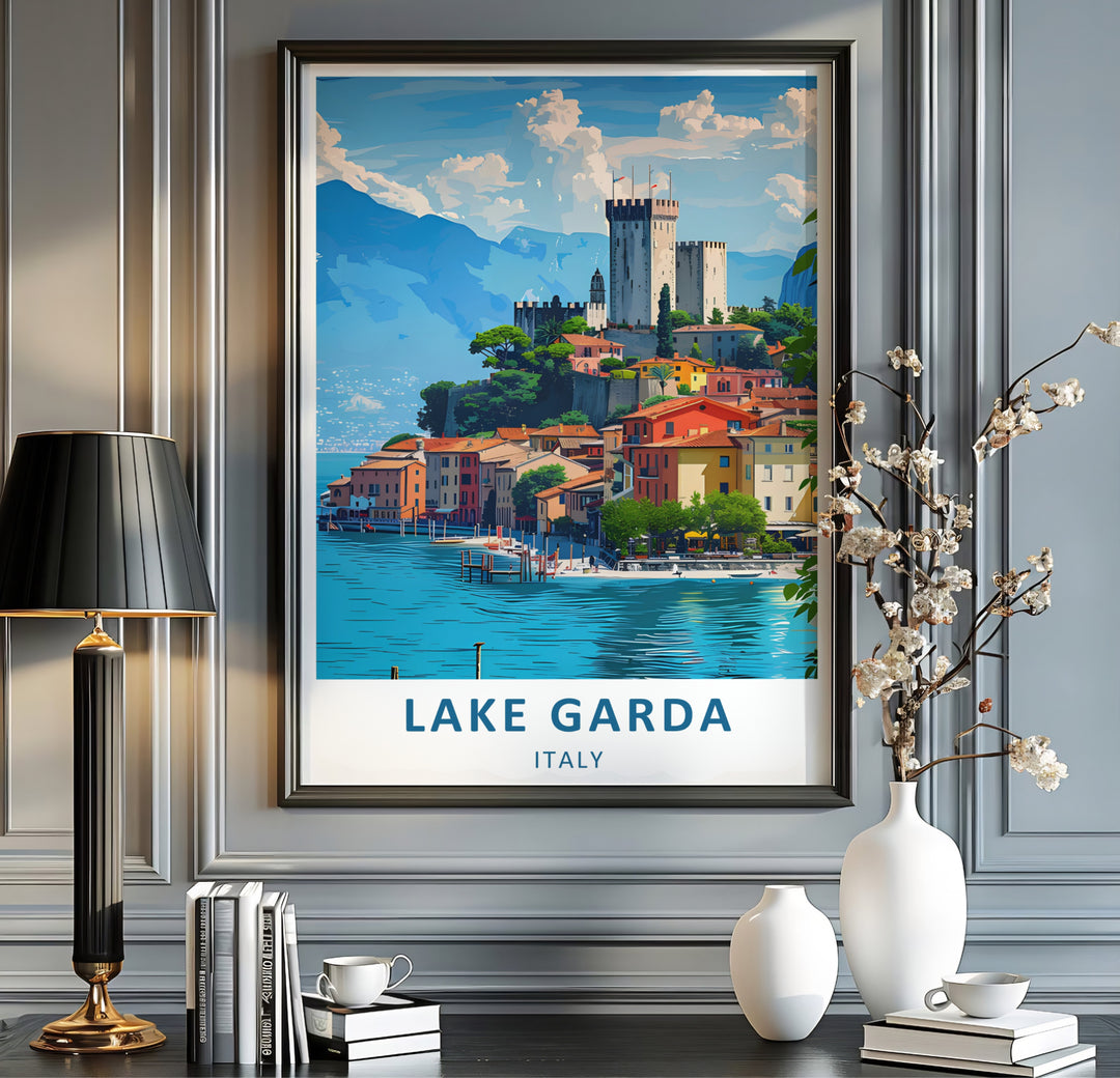A colorful graphic illustration of Malcesine Castle standing tall on the shores of Lake Garda, Italy, surrounded by charming waterfront buildings and clear blue waters; available for your home decor setup as an unframed poster print, wrapped canvas print, or custom framed display.