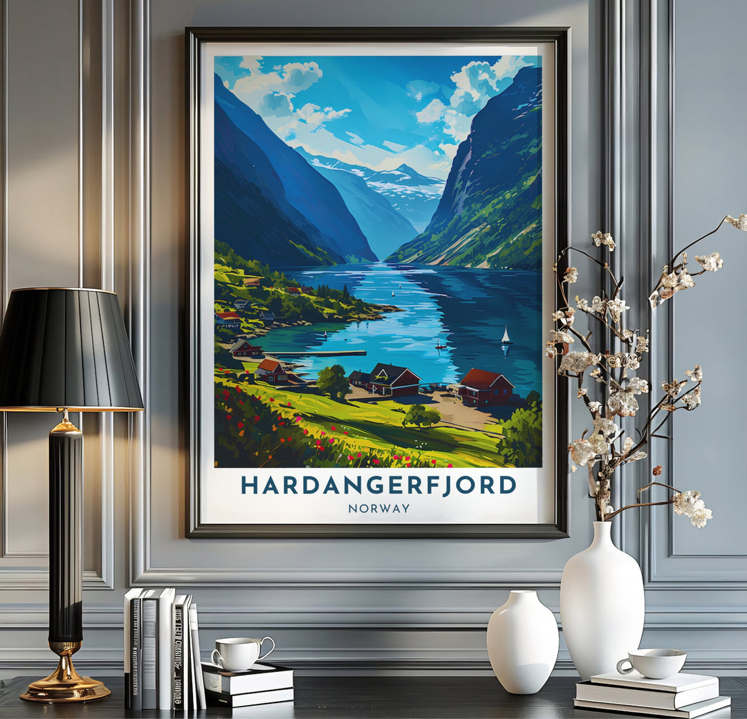 Scenic graphic print of Hardangerfjord Norway with red cottage homes along a tranquil coastal inlet. Upgrade your room interior with this travel artwork available across physical formats such as unframed paper prints, protective framed designs, and gallery wrap canvas prints.