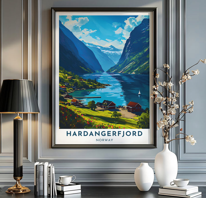 Scenic graphic print of Hardangerfjord Norway with red cottage homes along a tranquil coastal inlet. Upgrade your room interior with this travel artwork available across physical formats such as unframed paper prints, protective framed designs, and gallery wrap canvas prints.