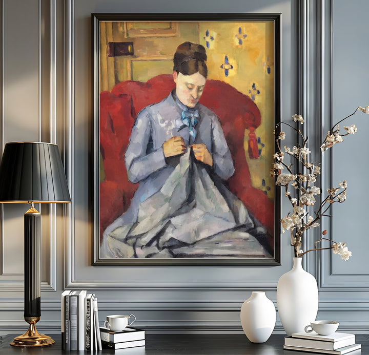 Historic 1877 artwork poster of Paul Cezanne Madame Cezanne Sewing 1877 rendered with soft oil paint strokes in Paris France. Order custom framed prints, unframed paper wall art, or gallery canvas options from MapYourDreams to transform your living room aesthetics.