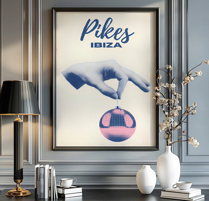 Pikes Ibiza surrealist wall art print showing a halftone stipple hand holding a pink mirror ball under navy script headers, presented by MapYourDreams as an unframed fine art print, gallery canvas decor, or custom framed wall art in bronze and gold frame choices.