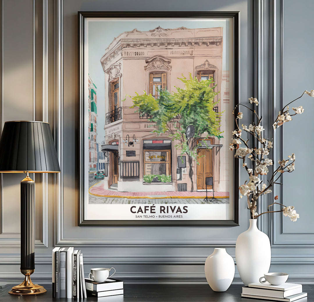 Sweeping across the historic street corner in South America, this San Telmo Cafe Rivas wall decor highlights ornate window cornices and wrought-iron details, brought to you by MapYourDreams in flexible paper, custom framed, and canvas wrap selections.