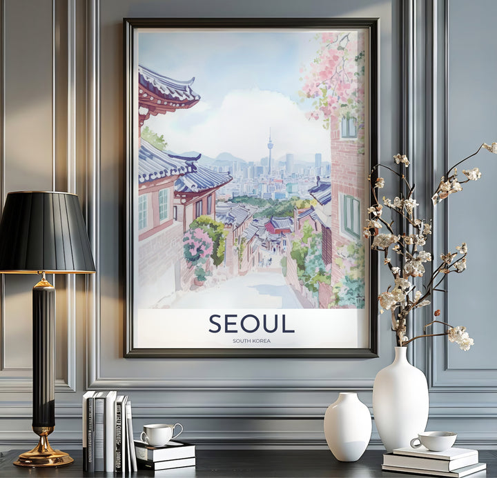 Modern vintage travel print with clean white margins and crisp typography reading SEOUL SOUTH KOREA beneath a soft watercolor painting of Bukchon Hanok Village in Seoul. Offered by MapYourDreams, this artwork is available in flexible options including unframed paper, custom wooden frames, and gallery canvas wraps.