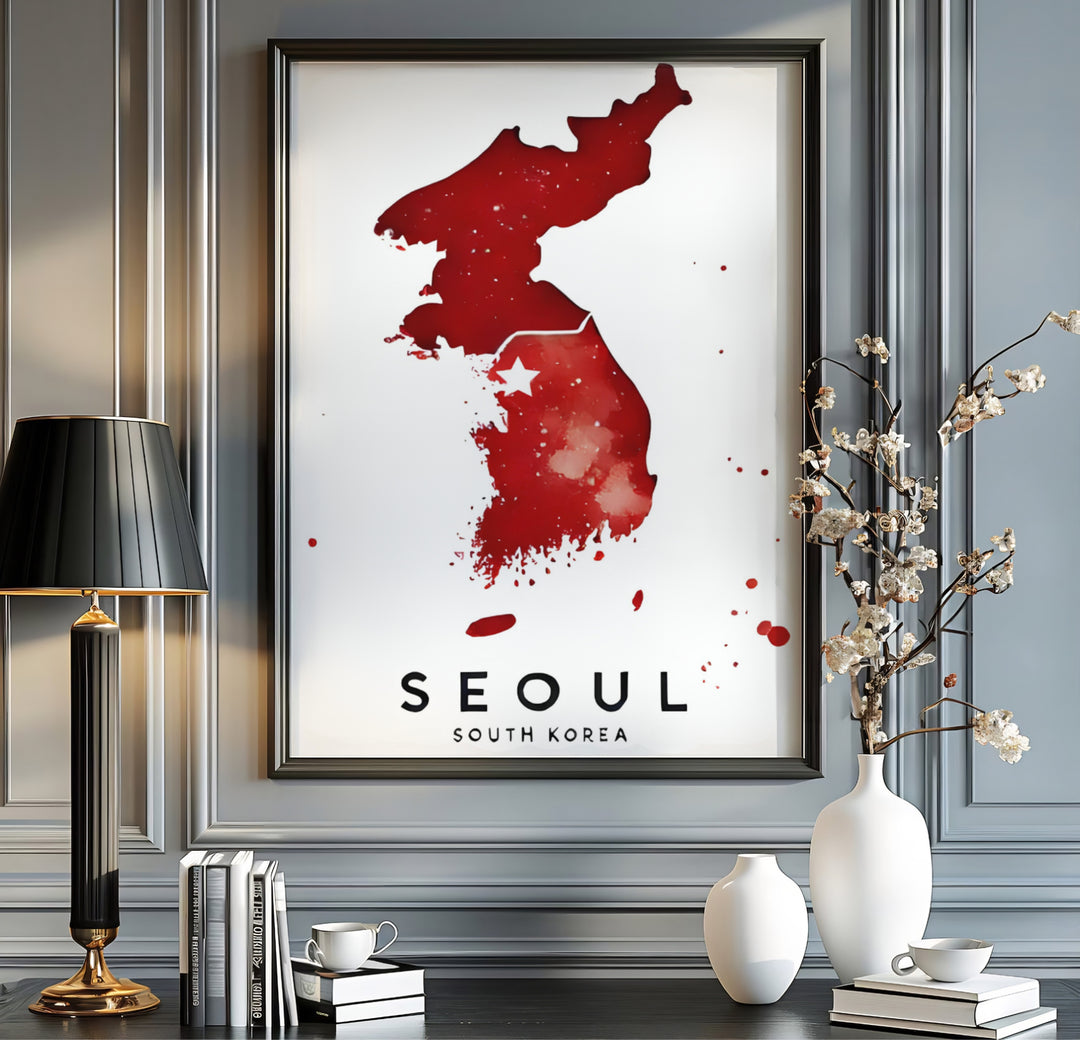 Bold crimson and white map art print featuring the Korean peninsula wash and star over Seoul, South Korea, curated by MapYourDreams across unframed archival paper, natural wood frames, and gallery stretched canvas to deliver premium quality print aesthetics to your wall.