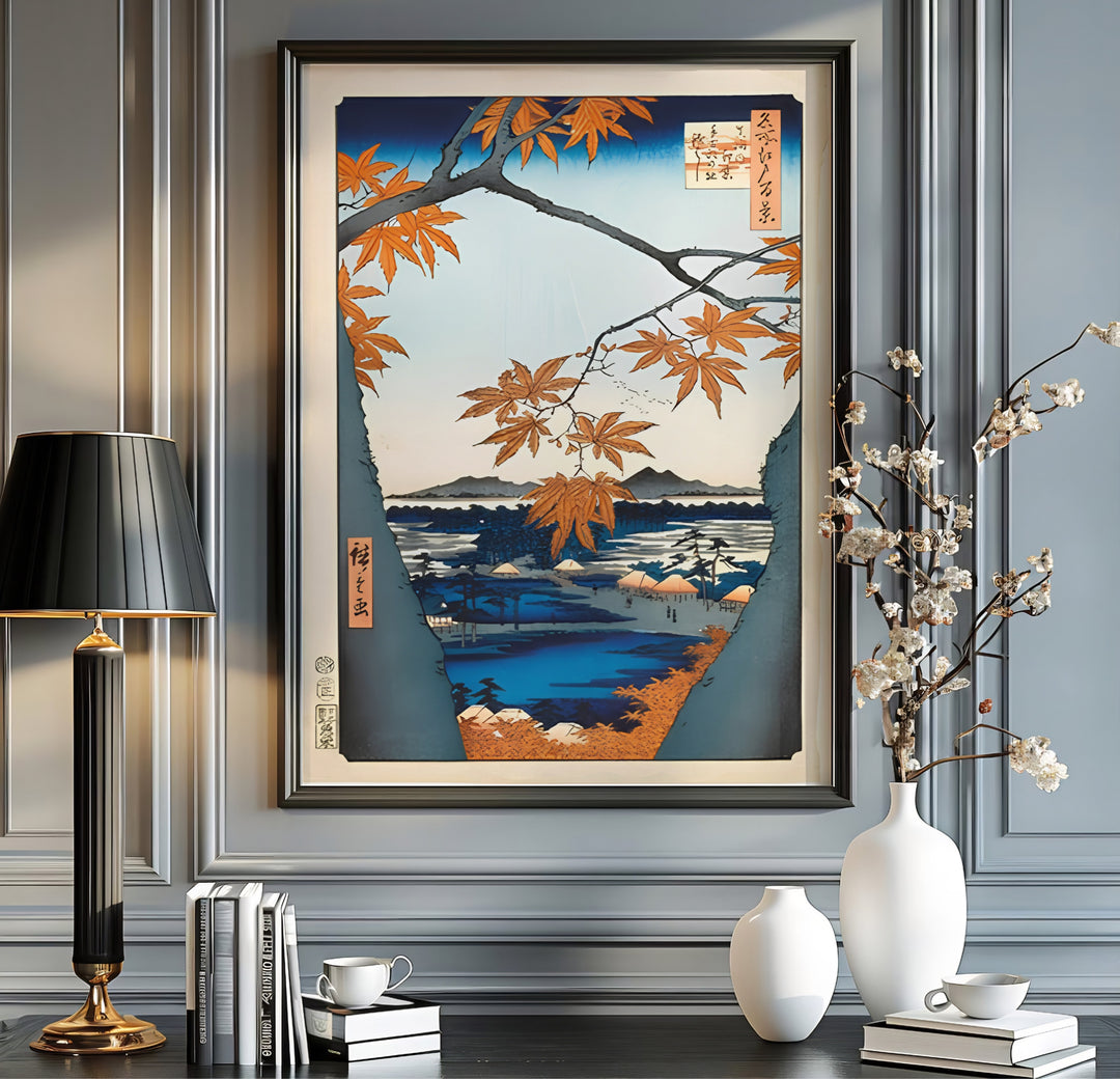 Japanese autumn foliage print Maple Trees at Mama with warm amber foliage by artist Utagawa Hiroshige inspired by nature art at Maple Trees at Mama and Tekona Shrine. MapYourDreams offers versatile framed, unframed, and canvas print wall decor formats.