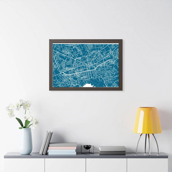 Featuring the vibrant street grid of central Tirana in sharp white contrast, this teal blue road map print celebrates Albania&