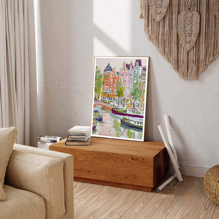 Romantic travel decor print of Amsterdam canal waterways and historic buildings, produced by MapYourDreams and available in three distinct formats: fine art unframed paper, stretched canvas, or custom framed decor options to complement impressionist or vintage aesthetics.