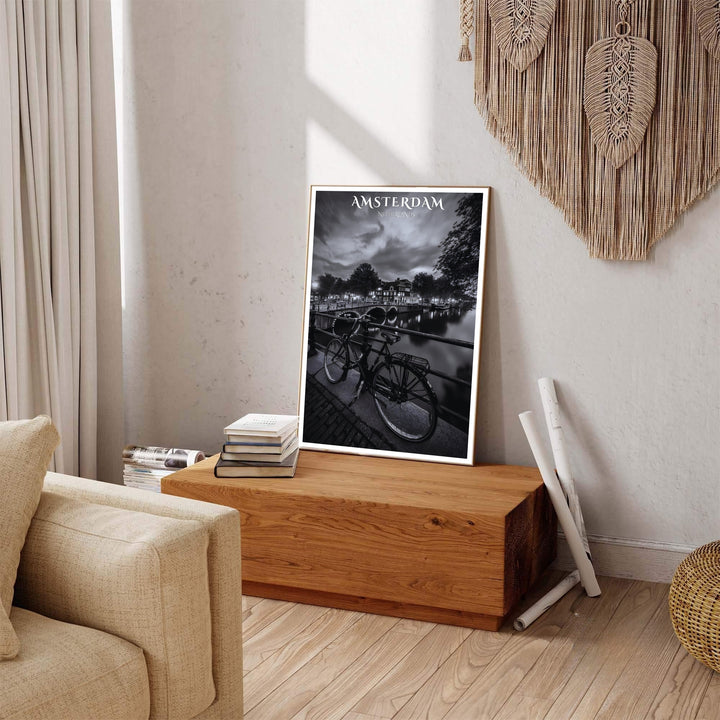 Dramatic nocturnal canal print of an Amsterdam streetscape rendered in crisp black and white photography, produced by MapYourDreams with available product options including fine art unframed paper, stretched canvas, or custom framed decor to suit elegant, moody residential wall spaces.