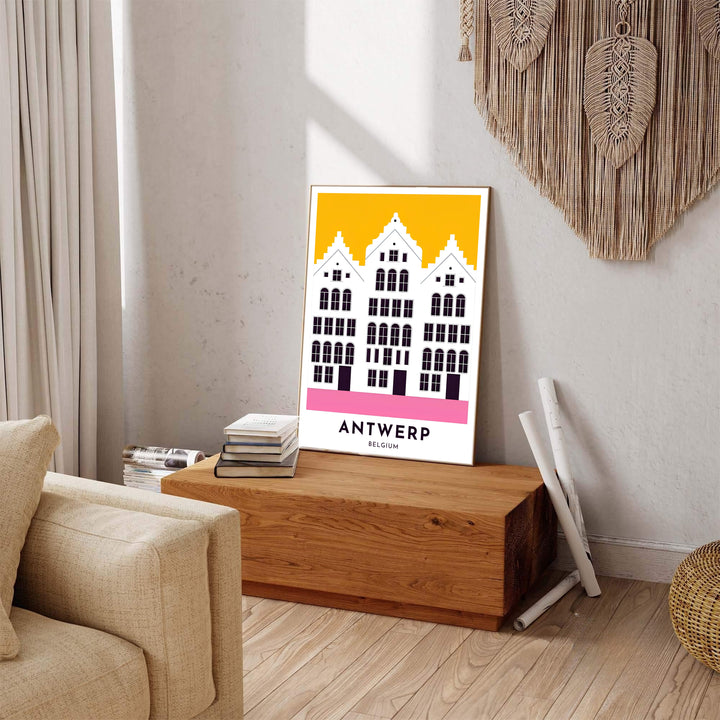 A minimalist architectural poster of Antwerp, Belgium, complete with lower center typography and stylized white stepped roofs against mustard yellow. Available across multiple options including unframed art paper, custom framed poster styles, and gallery canvas wall displays.