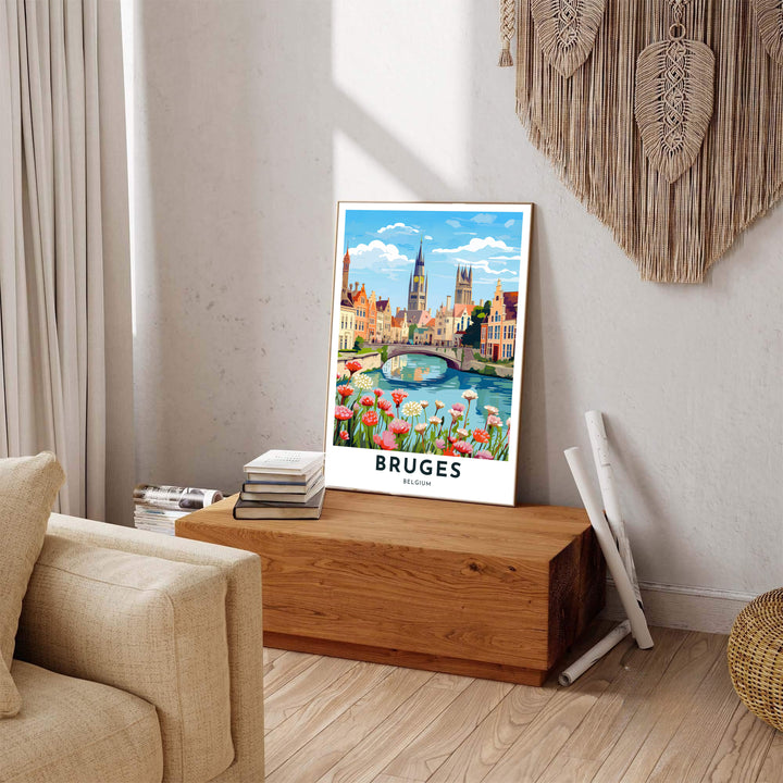 A picturesque canal print displaying blooming flora, a stone bridge, and historic towers in Bruges, Belgium, with the city name cleanly displayed. Available across multiple options including unframed art paper, custom framed poster styles, and gallery canvas wall displays.