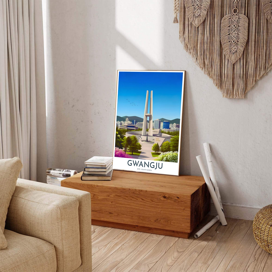 Colorful South Korean travel print displaying a symmetrical view of the May 18 Memorial Tower in Gwangju, flanked by lush green trees, pink azaleas, and modern buildings. Offered by MapYourDreams, this artwork is available in flexible options including unframed paper, custom wooden frames, and gallery canvas wraps.