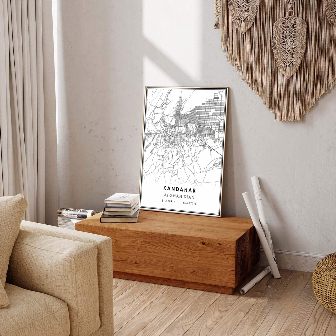 Black and white cityscape map art print featuring the city road layout, coordinate text, and crisp borders of Kandahar, Afghanistan. Available at MapYourDreams as an unframed art print, a stretched canvas wall art piece, or a custom framed poster in natural wood moulding for minimalist bedroom setups.