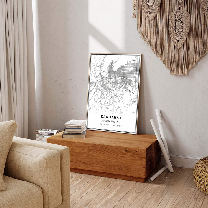 Black and white cityscape map art print featuring the city road layout, coordinate text, and crisp borders of Kandahar, Afghanistan. Available at MapYourDreams as an unframed art print, a stretched canvas wall art piece, or a custom framed poster in natural wood moulding for minimalist bedroom setups.