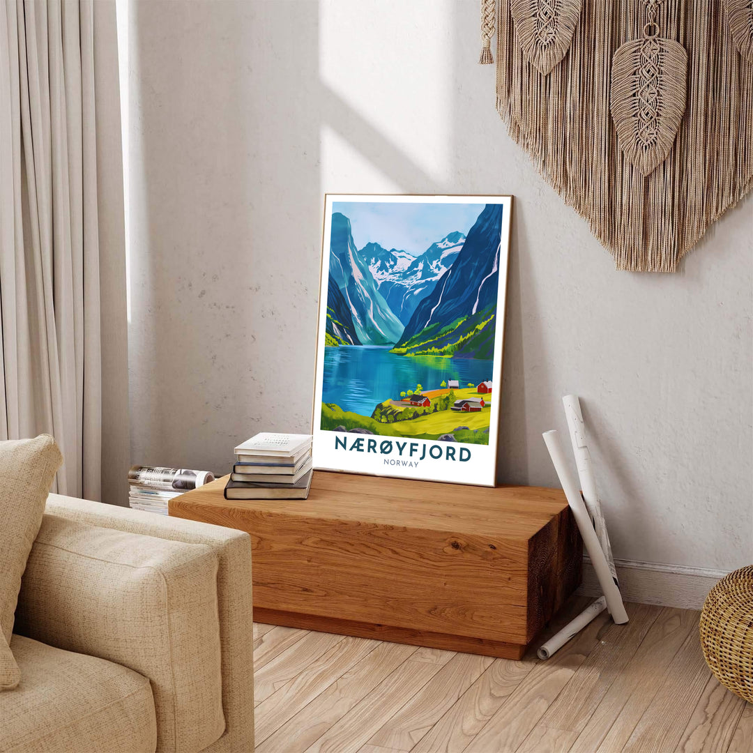 Crisp graphic travel poster of Nærøyfjord Norway featuring azure waters, sunlit mountain slopes, and red shoreline cabins. Carefully produced for lasting quality, this wall art selection includes versatile options like unframed art paper, solid wood framed prints, and textured canvas stretchers.