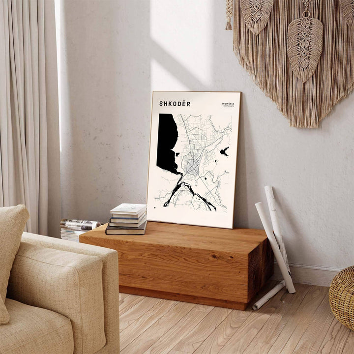 Jet black water shapes contrast sharply against warm off-white stock in this elegant Shkodër hydrology map poster featuring geographic coordinates. Offered by MapYourDreams in custom choices such as unframed paper, wood-framed options, and gallery-style canvas.