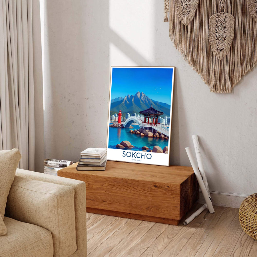Scenic coastal print detailing a red lighthouse, white footbridge, and pavilion in Sokcho South Korea, distributed by MapYourDreams in varied forms including unframed poster paper, sleek frames, and wrapped canvas to suit any interior wall layout.
