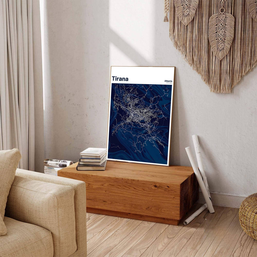 Pure white linework contrasts sharply against a deep navy blue liquid marble field in this elegant Tirana map poster featuring portrait framing. Offered by MapYourDreams in custom choices such as unframed paper, wood-framed options, and gallery-style canvas.