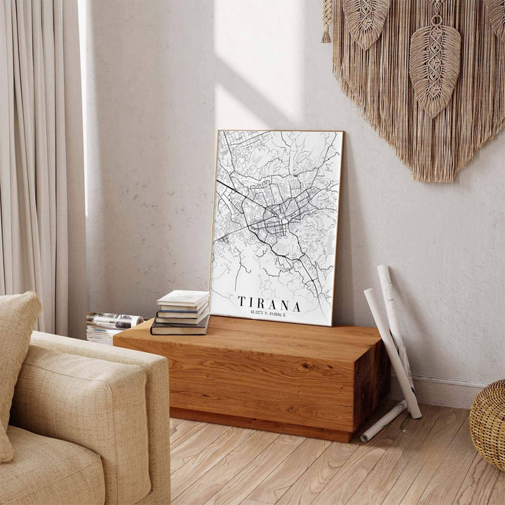 Pure black linework contrasts sharply against a clean off-white field in this elegant Tirana map poster featuring vertical portrait framing. Offered by MapYourDreams in custom choices such as unframed paper, wood-framed options, and gallery-style canvas.