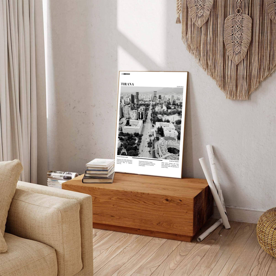 Deep charcoal shadows contrast sharply against bright rationalist facades in this elegant Black &amp; White photographic Tirana boulevard poster featuring geographic views. Offered by MapYourDreams in tailored options including unframed paper, framed presentations, and canvas wraps.