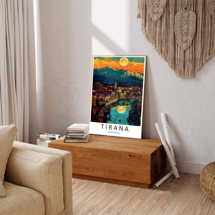 Deep indigo shadows contrast sharply against glowing amber sunset skies in this elegant Tirana clock tower poster featuring evening river views. Offered by MapYourDreams in tailored options including unframed paper, framed presentations, and canvas wraps.