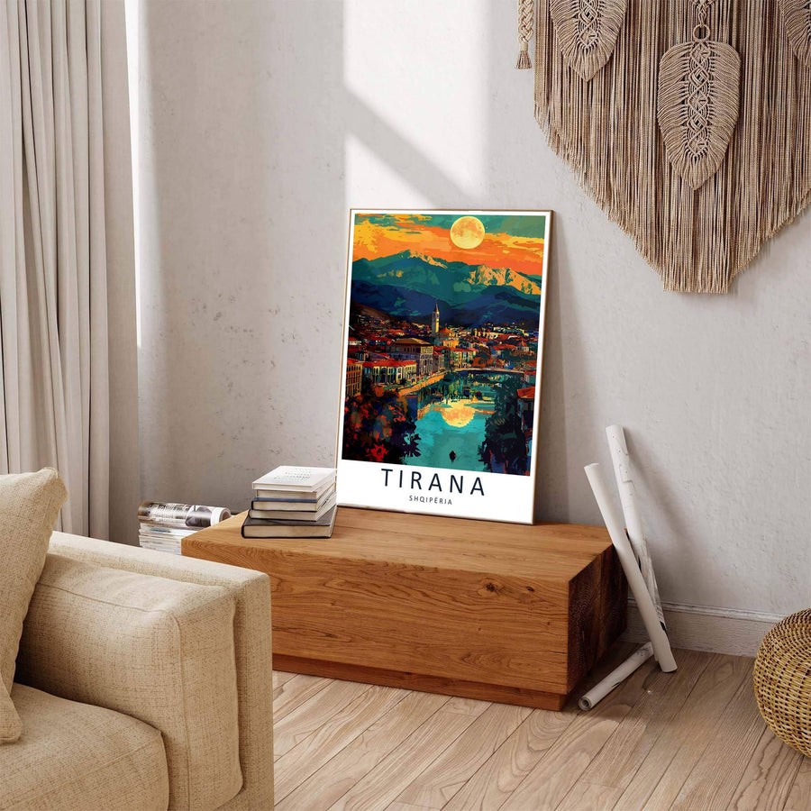 Deep indigo shadows contrast sharply against glowing amber sunset skies in this elegant Tirana clock tower poster featuring evening river views. Offered by MapYourDreams in tailored options including unframed paper, framed presentations, and canvas wraps.