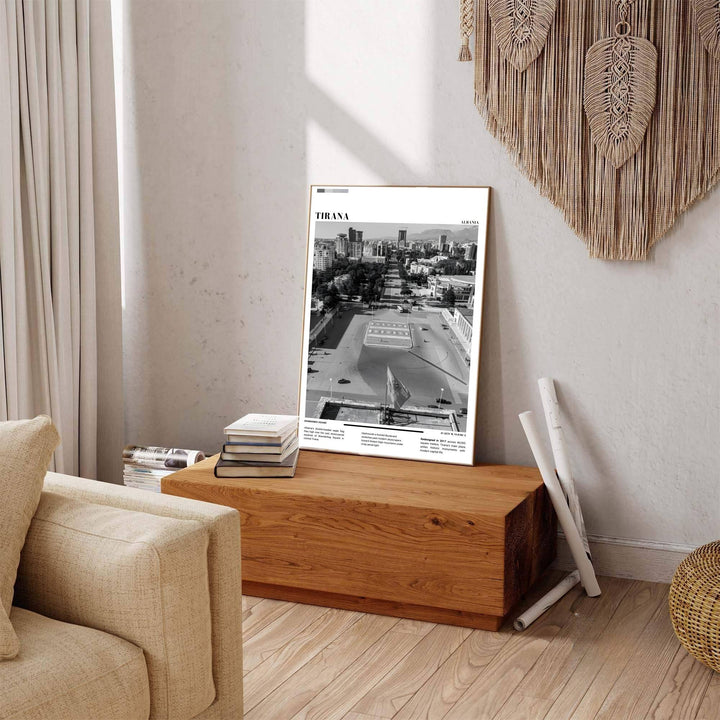 Deep charcoal shadows contrast sharply against bright stone paving stones in this elegant Black &amp; White photographic Tirana square poster featuring geographic views. Offered by MapYourDreams in tailored options including unframed paper, framed presentations, and canvas wraps.