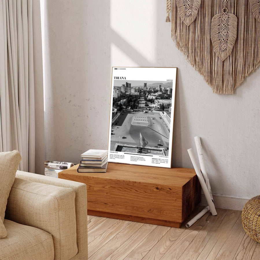 Deep charcoal shadows contrast sharply against bright stone paving stones in this elegant Black &amp; White photographic Tirana square poster featuring geographic views. Offered by MapYourDreams in tailored options including unframed paper, framed presentations, and canvas wraps.