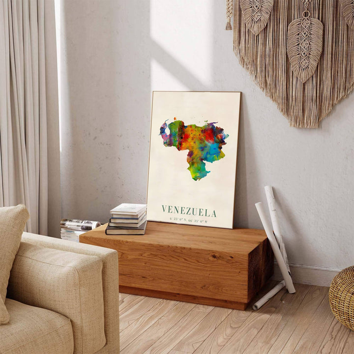 Action-painted country silhouette illustration depicting colorful paint splatters and droplets inside Venezuela&