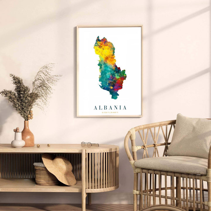 Minimalist Albania country map poster rendered in bright yellow, aqua, and red watercolor tones with clear geographic coordinates printed below. Offered by MapYourDreams, this artwork is available in flexible options including unframed paper, custom wooden frames, and gallery canvas wraps.