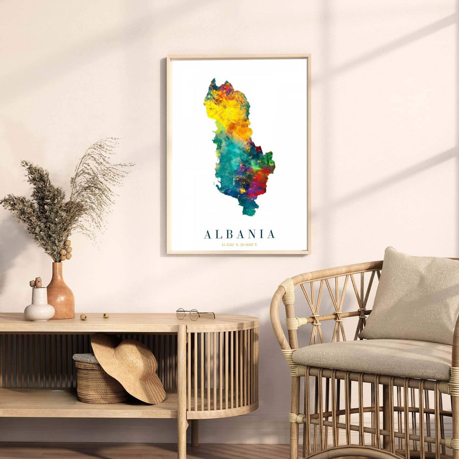 Minimalist Albania country map poster rendered in bright yellow, aqua, and red watercolor tones with clear geographic coordinates printed below. Offered by MapYourDreams, this artwork is available in flexible options including unframed paper, custom wooden frames, and gallery canvas wraps.