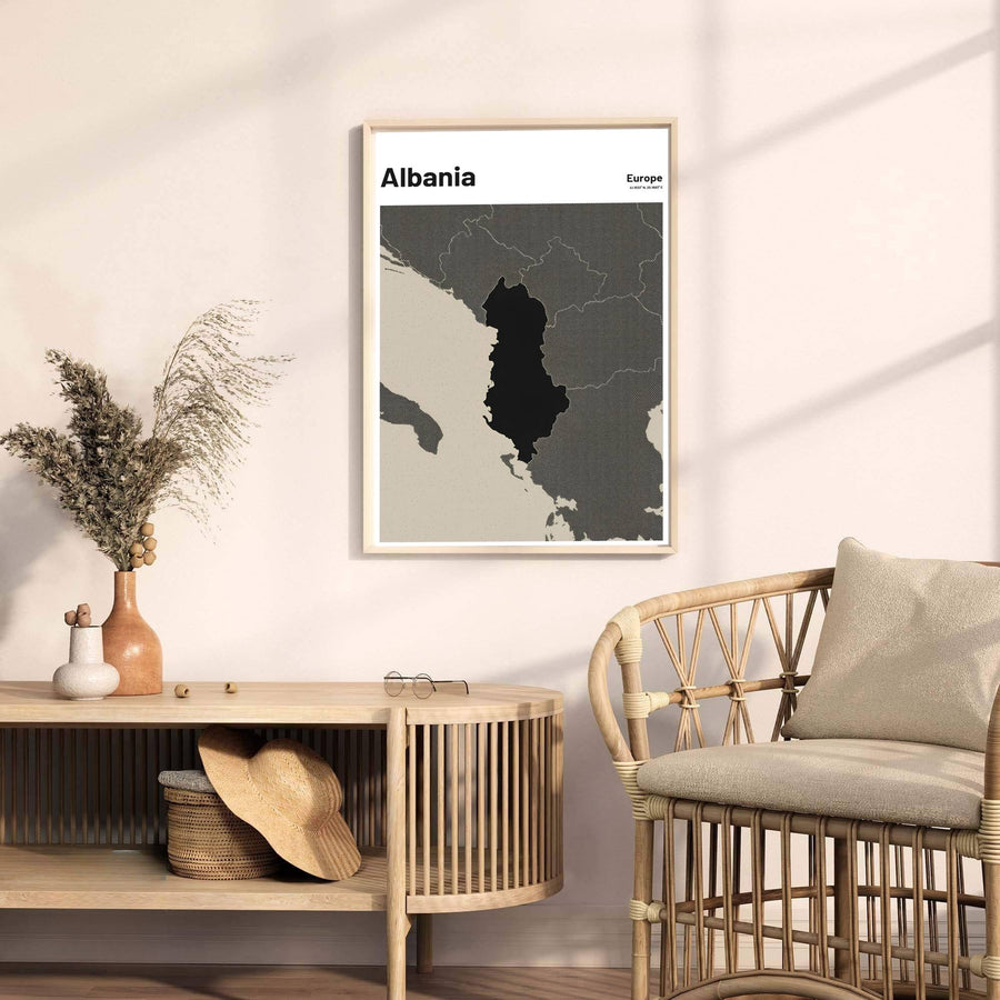Minimalist Albania country map poster rendered in deep slate grey and black tones with clear geographic coordinates printed in the top corner. Offered by MapYourDreams, this artwork is available in flexible options including unframed paper, custom wooden frames, and gallery canvas wraps.