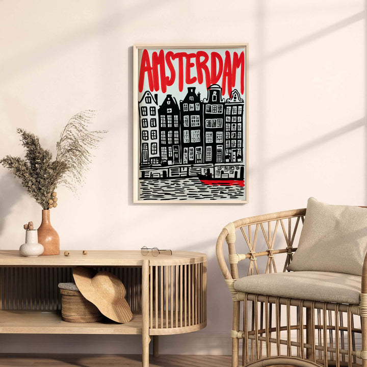 Detailed woodcut style cityscape wall art depicting canal house gables and water ripples in Amsterdam, available from MapYourDreams where you can opt for unframed paper prints, stretched gallery canvas, or a tailored custom framed wall display for creative work spaces.