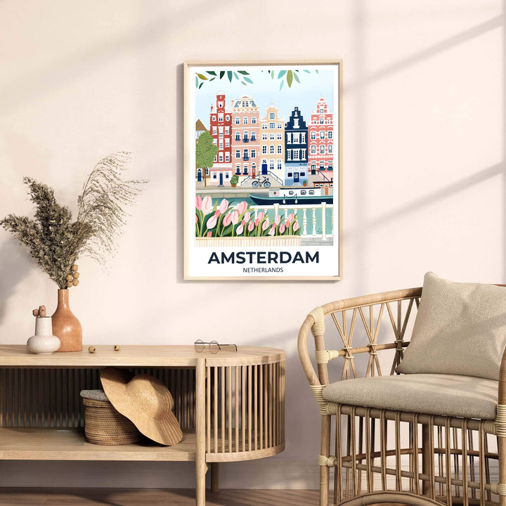 Whimsical pastel city poster of historic Amsterdam canal architecture fronted by soft pink tulips and leafy branches, provided by MapYourDreams with available options like unframed paper prints, gallery canvas, or custom frame finishes in natural wood, pure gold, and bronze for home offices.