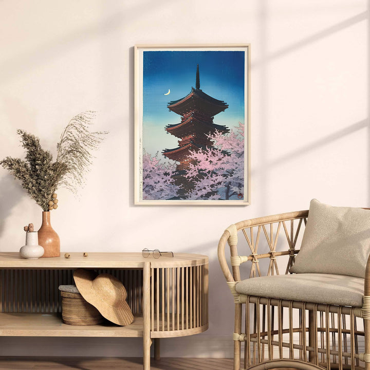 Traditional Japanese woodblock pagoda print Spring Evening Ueno by artist Kawase Hasui displaying detailed roof finial at Spring Evening Ueno. MapYourDreams provides premium framed, unframed, and canvas prints.