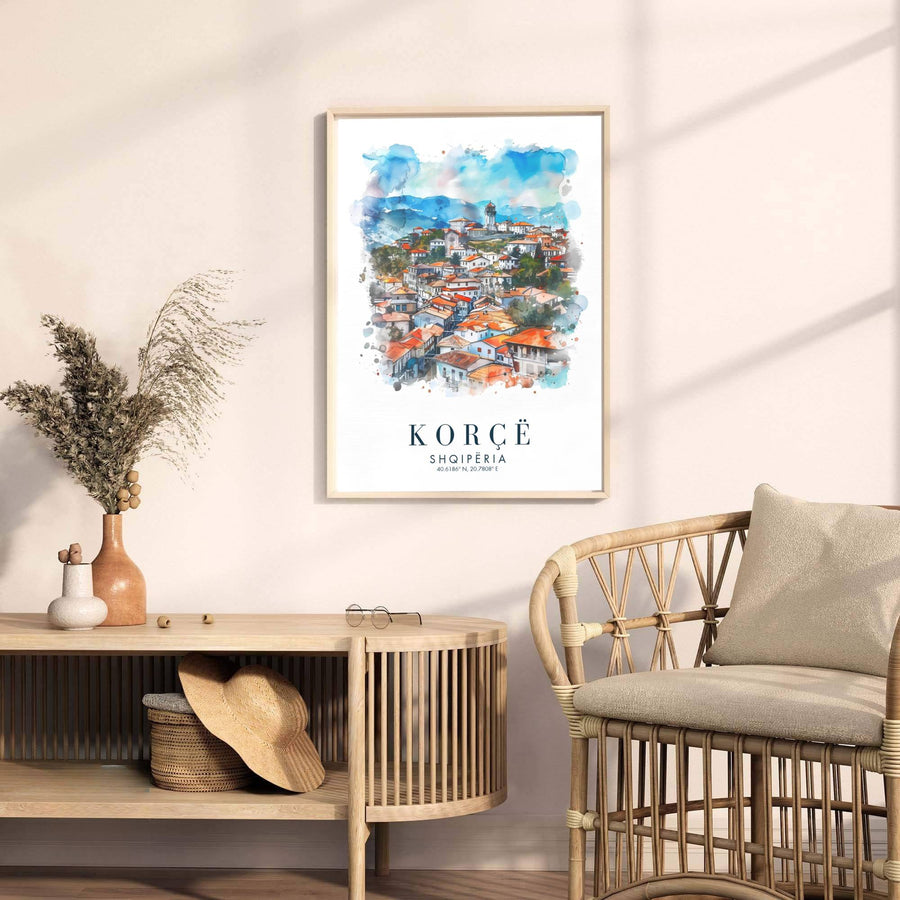 Looking past traditional stone houses toward rolling highland hills, this Korçë art print celebrates Albanian heritage and southeastern mountain views. Select your preferred format, such as unframed fine art paper, a custom wood frame, or a gallery canvas wrap.
