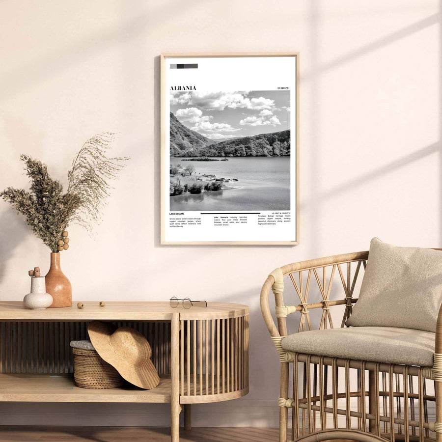 Looking past serene shoreline waters toward rugged mountain peaks, this Lake Koman art print celebrates Albanian wilderness and modern design. Select your preferred format, such as unframed fine art paper, a custom wood frame, or a gallery canvas wrap.