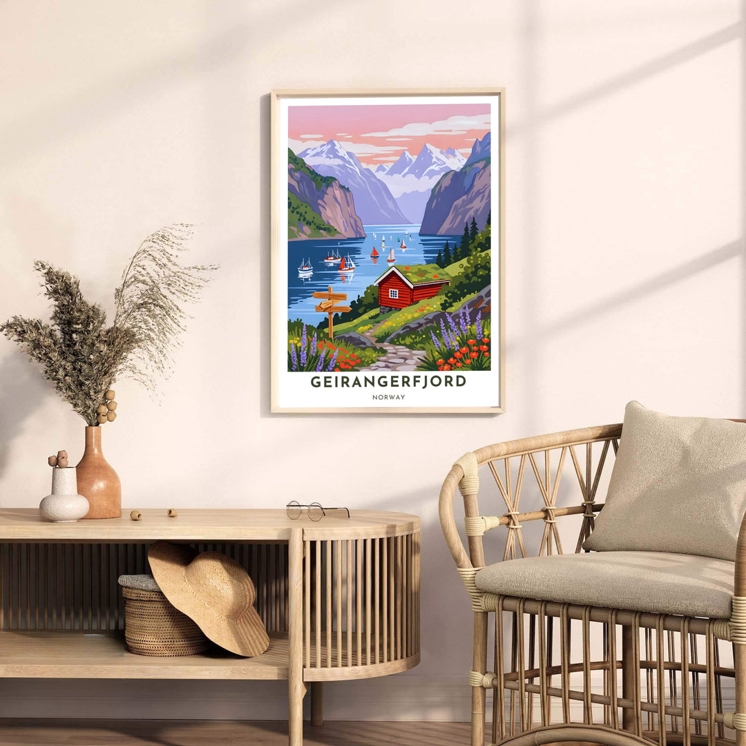 Scenic graphic art print showcasing Geirangerfjord Norway during sunset with vibrant red cottage accents and dramatic coastal cliffs. Elevate your room interior with this travel artwork available across several physical formats such as unframed paper prints, protective framed designs, and gallery wrap canvas prints.